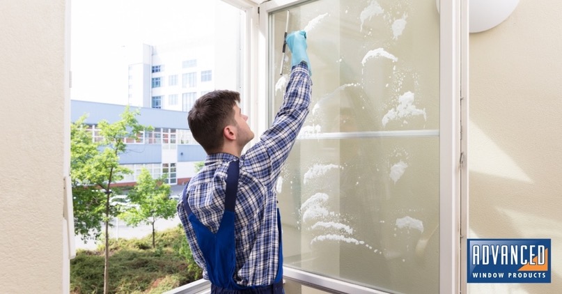 Man Cleaning Window